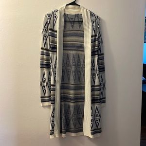 Charlotte Russe long sweater size small with detail. Thin and lightweight